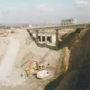 The M1 slip road bridge and portal of the M1 tunnel with excavation for the Lofthouse cutting in progress. Looking north from Longthorpe Lane Bridge. Photograph taken 25 September 1998.
