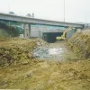The completed M62 slip road bridge and M62 tunnel portal, and earthworks for the free flow link cutting. Photograph taken 8 August 1998.