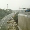 The free flow link road as it leaves the M62 Tunnel. Photograph taken 3 December 1998.