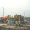 Slipform paving machine used to cast the 1.5m V shaped concrete channel. Photograph taken on 3 December 1998.