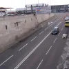 Looking at the approach ramp, the roadway is not much changed from its original appearance. Towards the top, it widens to three lanes. When it first opened the tunnel had toll booths immediately at the tunnel mouth and this extra space would have been very valuable.