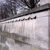 The retaining walls are decorated with this curtain-like carving.