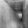 January, 1931, a lonely worker inspects the concrete somewhere far beneath the Mersey. This the southern side of the lower deck, inside one of two ventilation shafts. The small holes in the ceiling are "airports" — not in the modern sense, of course. They allow air to circulate from the traffic space above into the duct.