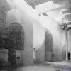 At Sidney Street, this could be a scene from the film Metropolis, but it's actually two of the enormous fan housings above ground. Again, the sense of scale is provided by two small people to one side.