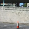 Engraved in the retaining wall on the north side of the cutting, and picked out in gold leaf, is the plaque commemorating the tunnel's opening in 1934.