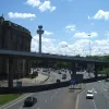 Another view of the southbound flyover carving across the front of the Museum, with the Radio City tower in the background.