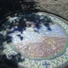 Close to the tunnel portal itself is this floor mosaic, showing the tunnel connecting both sides of the Mersey. The inscription around the edge reads "Map of Queensway Tunnel, built under control of the Mersey Tunnel Joint Committee", and goes on to state the construction period.