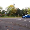 None of the roads here are particularly busy, which is just as well because the geometry of the junction is a little crude by modern standards. The entrance and exit points all require sharpish turns onto the roundabout itself.