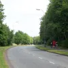 An example of one of the main roads, occasionally dualled but mostly single-carriageway. Here, Ordnance Avenue is a typical example, with excellent sightlines and extensive landscaping. (Warrington Borough Council have decided to err on the side of caution, however, and this road is a 30 limit.)  Note the tall, curved lights with orange sodium lamps.