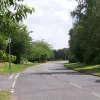 Another example of the local distributor, though this one (Admirals Road) is more obviously passing through a housing estate and encounters frequent bus stops and side turnings. None of the local distributors have any frontage development.