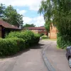 Deep within the housing estate are these lanes - designed to be narrow and enclosed, with poor sightlines that force drivers to slow right down. There are no footways and the jumble of houses seems to be an attempt at making a planned estate look more naturally developed.