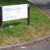 The original street name signs are rapidly disappearing - largely because they are made of fibreboard and are quite easy to kick in half. But they have a very smart New Town feel to them that the newer signs can't match.
