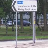 One of the most unusual points is that the utilitarian names that the Development Corporation assigned to the zones in their plan made it onto road signs and are still being put on them even today. Look hard enough and you'll find no shortage of signs like this one pointing to "Risley Employment Area".