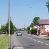 Across the roundabout and the A574 is back to its former glory. The wider section in the distance is the flyover across the M62.