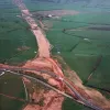 Hill House Farm and Sandy Lane overbridges, view east