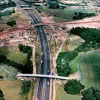 M6 interchange and Cuerden footbridge, view north