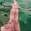 Hill House Farm and Sandy Lane overbridges, view east