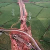 Hill House Farm and Sandy Lane overbridges, view east