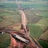 Hill House Farm and Sandy Lane overbridges, view east