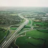 View west from M61 towards Tramway Lane