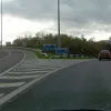 Off to the right. It looks like both these sliproads had two lanes until recently.