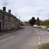 The road enters the village immediately and, though there's nothing to say it at this end, this is the beginning of the A6118.