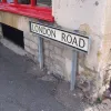 If this doesn't make much sense for the route of an A-road, the street sign gives it away. This is London Road, and until the 1920s it was the Great North Road. For a couple of years, between road numbers being introduced and the Wansford Bypass opening, it was the A1.