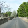 Here's why the village was bypassed so early on: the nine span single-track bridge over the river. A new bridge was provided just to the east for the A1.