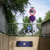 The roundabout is a relatively recent development, and has a rather out-of-place pedestrian subway underneath. It also has an unusual 60mph limit.
