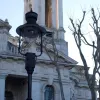 In the midst of a whole area lit only by gas, this light stands on Lord North Street in Westminster and is probably the commonest type still found in London. St John's Church is behind it.