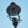 Around the corner on Dean Stanley Street is another just like it, if a little taller - but this one is brand new, installed in late 2017. The box housing the timer and the shade bear the manufacturer's name, Sugg.