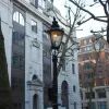 An older lamp stands on Dean Bradley Street, complete with an arm extending over the footpath for a lamplighter's ladder. It's been converted to timer operation, so nobody has to come and light it every evening.
