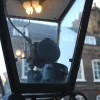 Another light mounted by the church steps on Smith Square is low enough to offer a view of the clockwork mechanism that operates the lamp. They are manually wound up about every two weeks.
