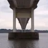 From beneath the bridge, the rumbling sound of traffic overhead is occasionally broken by loud thuds and metallic chimes where lorries bounce across expansion joints. The road deck is hollow metal box sections, with a thin layer of surfacing on top, so traffic vibration is amplified down here.