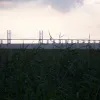 To the left, the Aust ferry terminal has a second striking view — the newer M4 Second Severn Crossing, opened in 1996, and its lengthy approach viaducts.