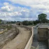 Looking south again from the bridge in the last shot, we get a panoramic view of the three modes of transport side by side in the monstrous cutting. The road here is still a mound of earth, but it's fairly easy to imagine how this will look when it's done.