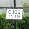 This (and the one above) are on a traffic island, but have been turned away from the road.  Photo by Chris Larsen