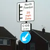 Another traffic island and some odd signage for a 20 zone.  Photo by Chris Larsen