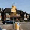 Here some white is left, though most of the sign face is now yellow. These signs are mounted on a fairly new post — it looks like a real effort is being made to preserve them.