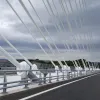 From the road deck the supporting cables, anchored into the central reservation, are truly enormous.