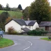 A run downhill through the woods at Churchill Down provides an omen of things to come, but generally the innocent motorist might think that the road towards Minehead held nothing more surprising than an occasional sharp corner, like this one at Clifton.