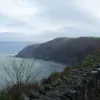 At the top of the hill, the A39 suddenly emerges from the trees to run along the top off the cliffs overlooking the Atlantic. Away to the left, there's a breathtaking view across Lynmouth Bay towards Foreland Point.