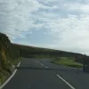 Turning inland at Countisbury, the A39 now crosses into Exmoor, passing cattle grids as it does. There are warnings of wild horses here.