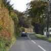 Crossing into Somerset, the road becomes a little more enclosed, and there's signs of affluence with the fashionable gastropub on the right and some grand country houses set back from the road.