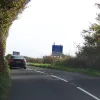 Rounding a corner, the first warning of the feature for which this road is famous: Porlock Hill lies ahead, once the nemesis of early motor vehicles and now, still, a challenge for the average motorist. Signs at both ends advise drivers — especially those with caravans — to consider the parallel toll road, which is less steep.