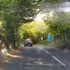 Another escape lane is coming up as we round a blind left-hand bend.