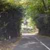The final part of the hill is this ruler-straight descent, still 1 in 4, which finishes on a last hairpin into the village. Directly ahead is a house, which has seen its fair share of vehicles coming towards it at terminal speed. This is the steepest A-road anywhere in the UK.