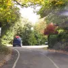 The route out of the village involves another hill to the east — nothing like as steep or challenging as Porlock Hill itself — but to get up it more easily, a peculiar one-way system exists that puts downhill traffic on the direct, steeper road and uphill traffic on an easier route to one side. There's an unusual single white line down the middle of the road here.
