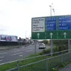 Leaving the city by Meadow Road, the second large gyratory is where the A653 meets the M621. Three lanes of traffic turn the corner and prepare to divide.