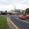 Three lanes of traffic from the M621 westbound wait to proceed into the city. The carriageway from the left is where M621 eastbound traffic joins.